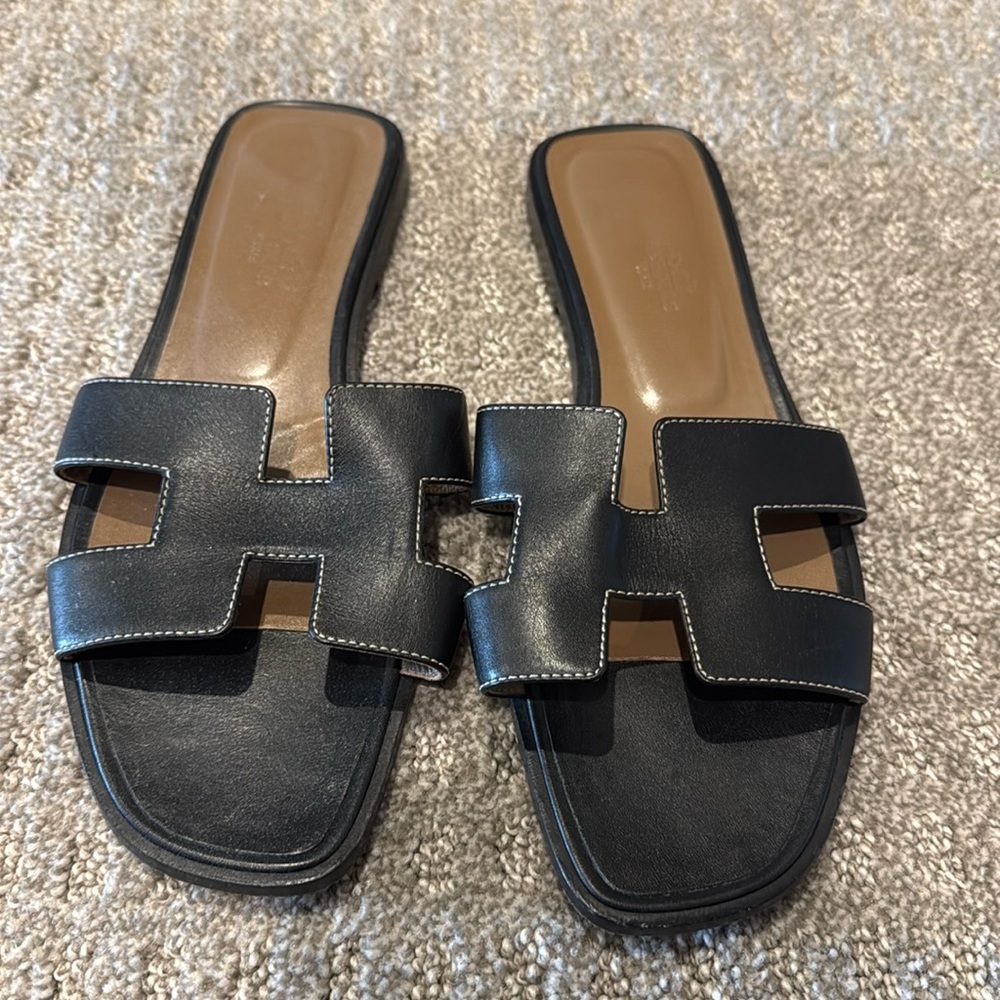 Authentic Hermes leather flat.